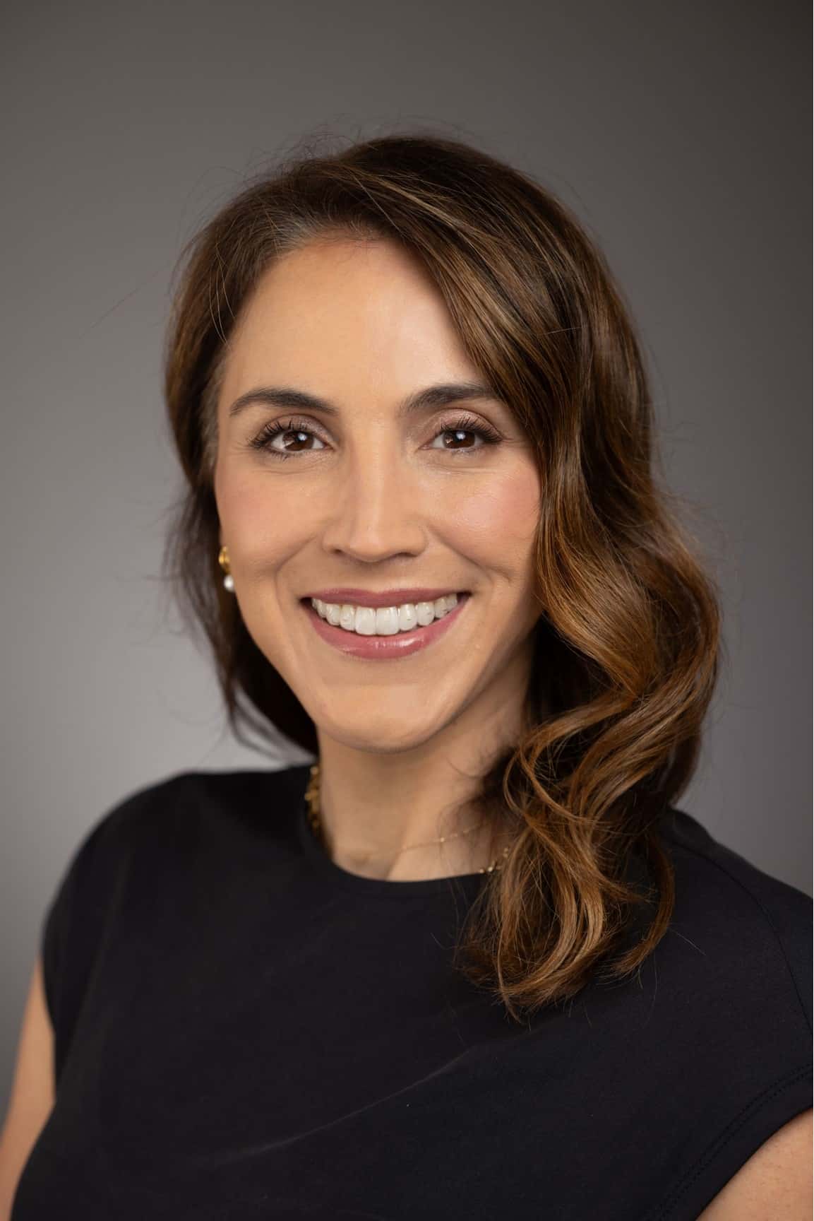 Headshot of Dr. Crystal Schneider, guest on MDIB Podcast